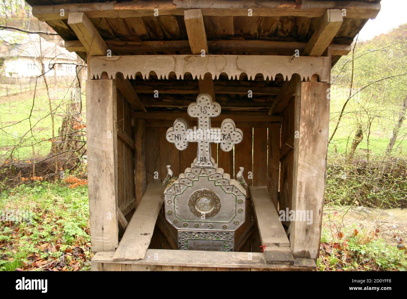 Roadside crucifix in Romania's countryside with the Greek word NIKA on it,  meaning "Jesus Christ is victorious Stock Photo - Alamy