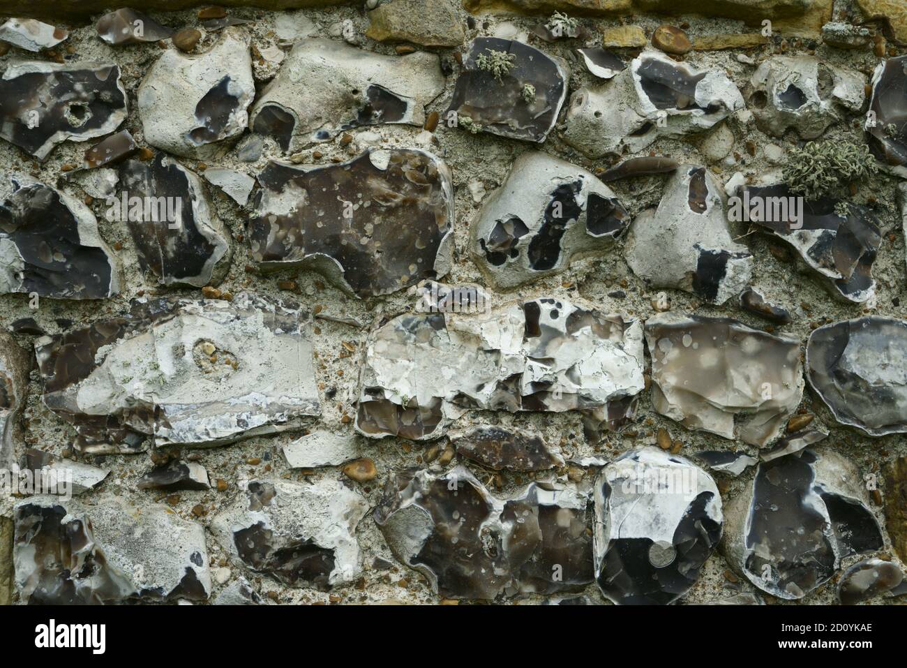 A close up of Hamsey church flint wall East sussex UK. Stock Photo