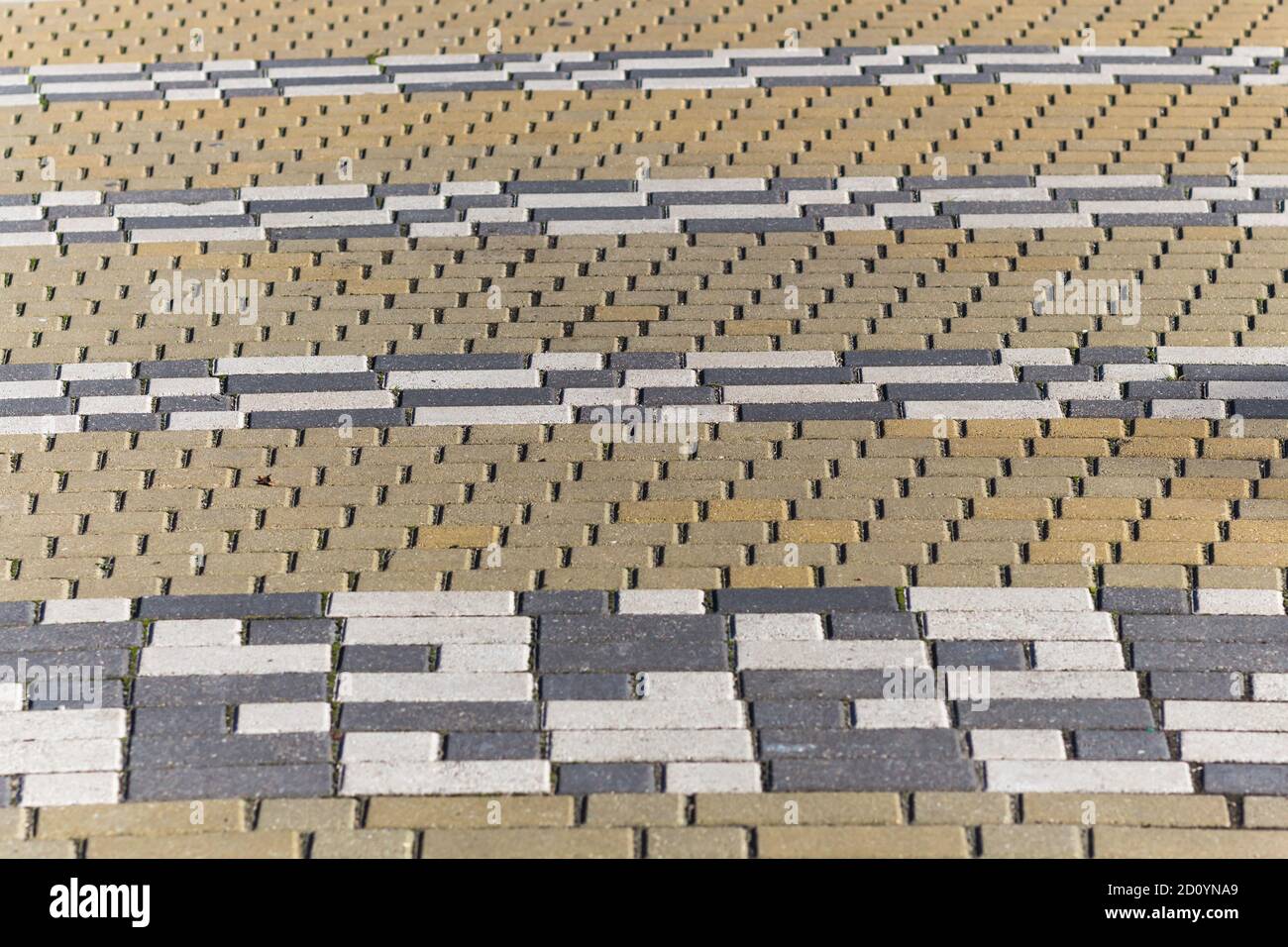 striped pattern of rectangular tiles in the park Stock Photo