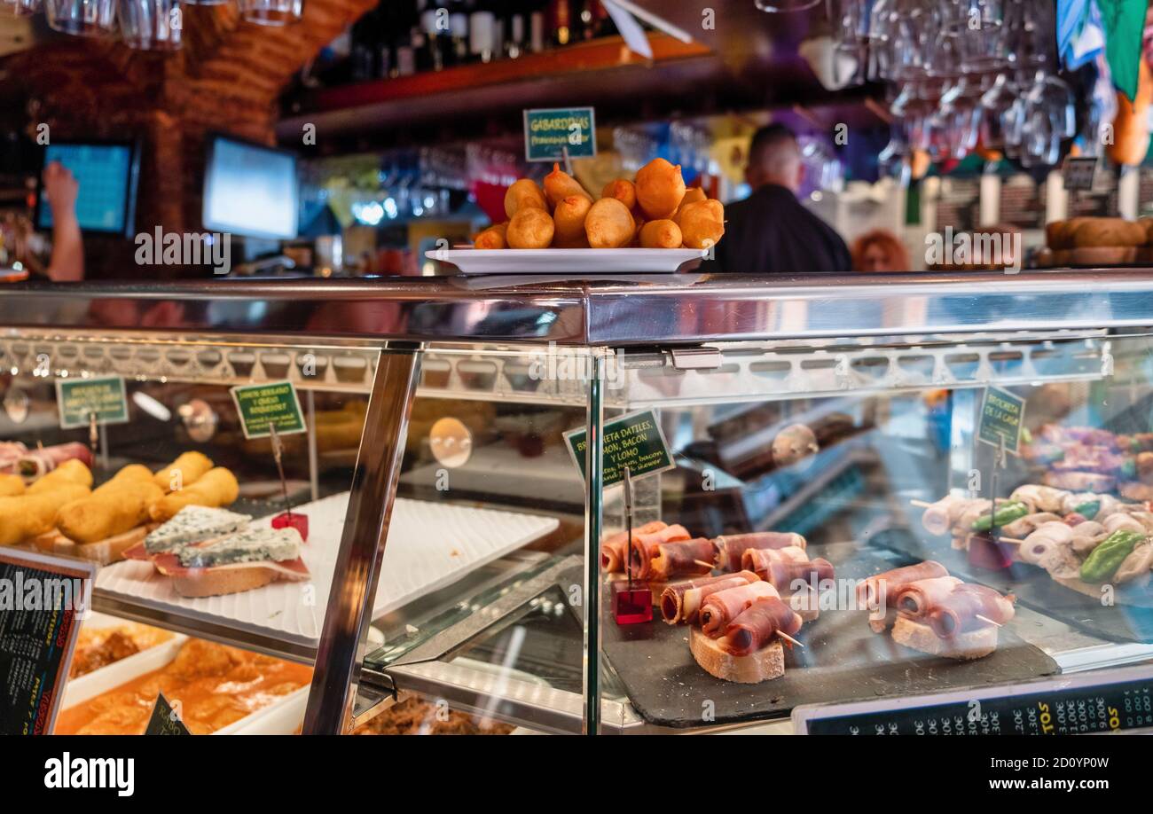 Benidorm, Alicante Province, Spain October 5, 2019, tapas in a showcase of the tapas bar 'Cava Aragonesa' on Calle Santo Domingo in the old town Stock Photo