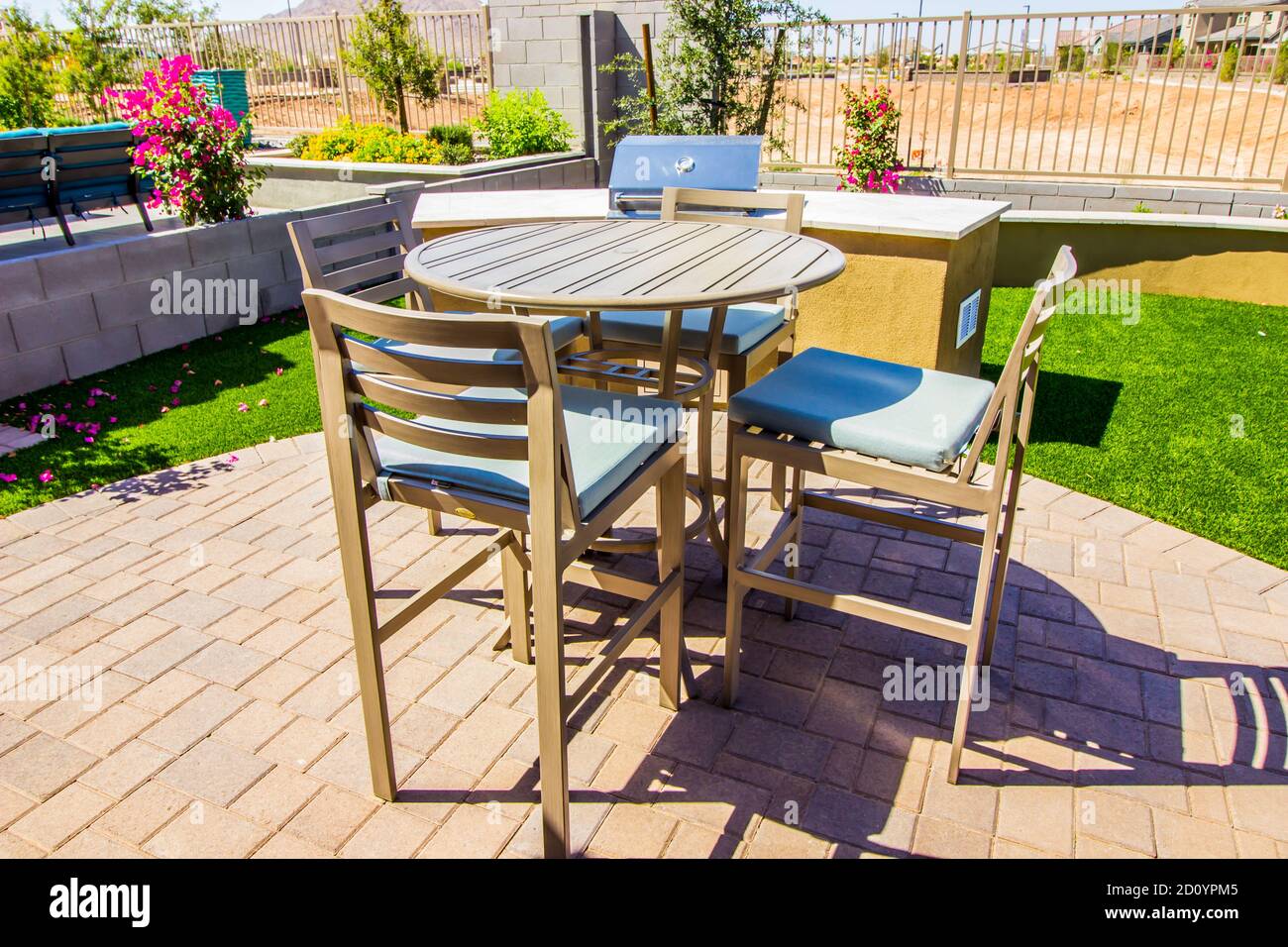 Rear Yard Patio Setting With Tall Table & Four Chairs Stock Photo Alamy