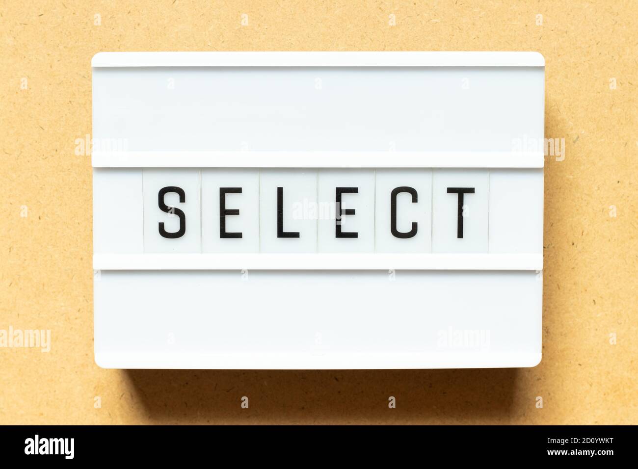 Lightbox with word select on wood background Stock Photo