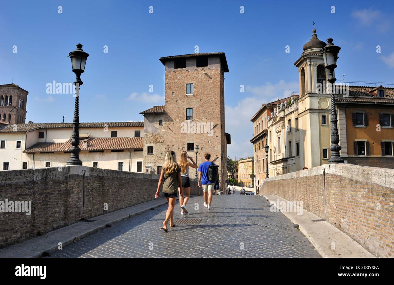 italy, rome, isola tiberina, pons fabricius, ponte fabricio, ancient roman bridge (62 BC) and torre dei caetani medieval tower Stock Photo