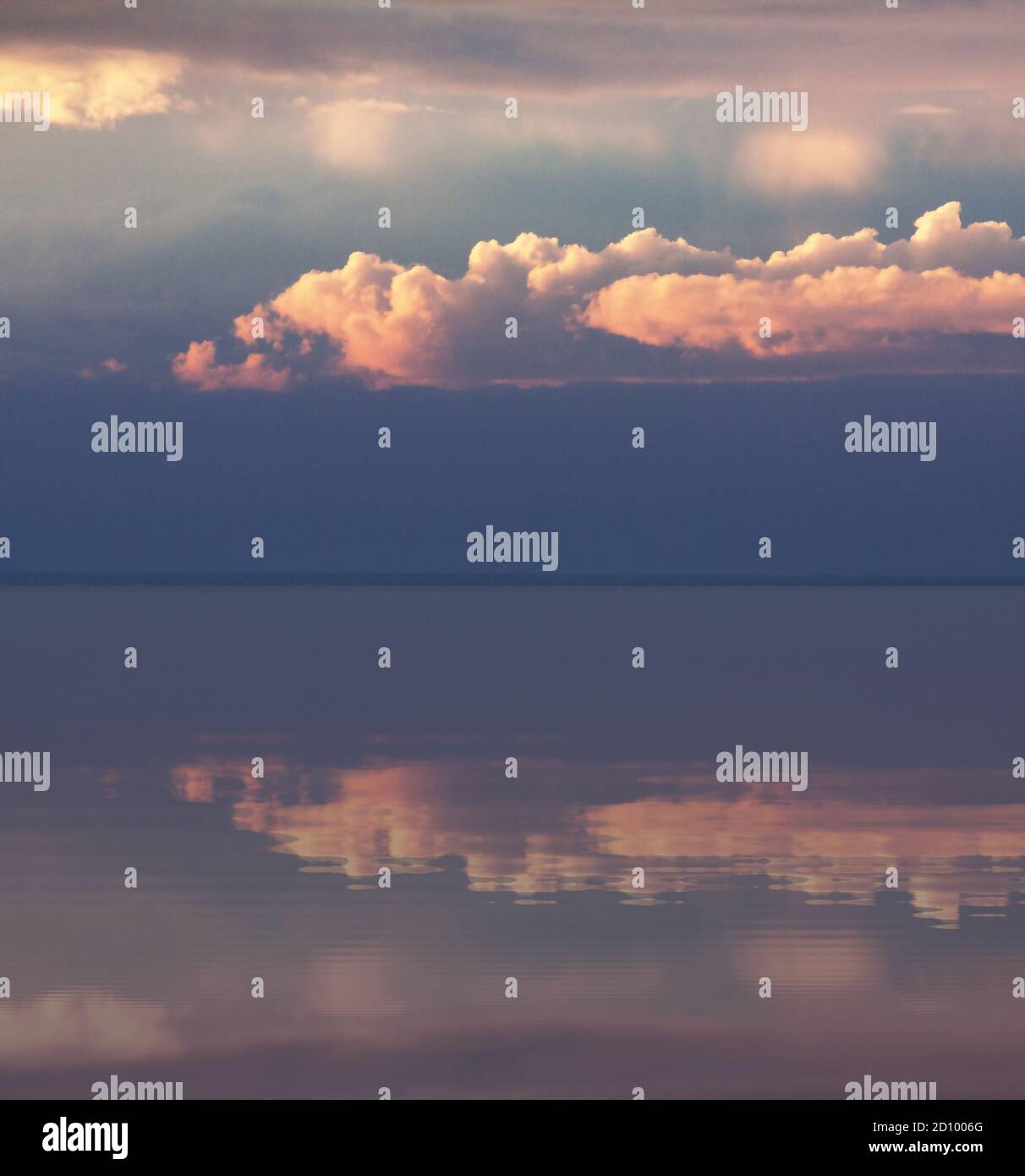 Late afternoon cloudscape reflected in water Stock Photo