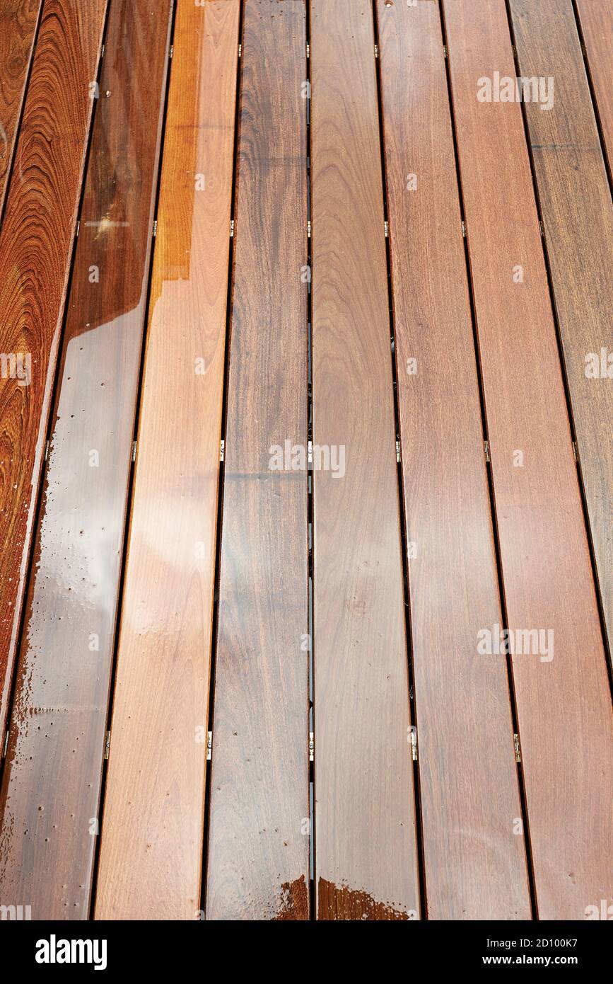 Wet hardwood floor on patio in exterior Stock Photo Alamy