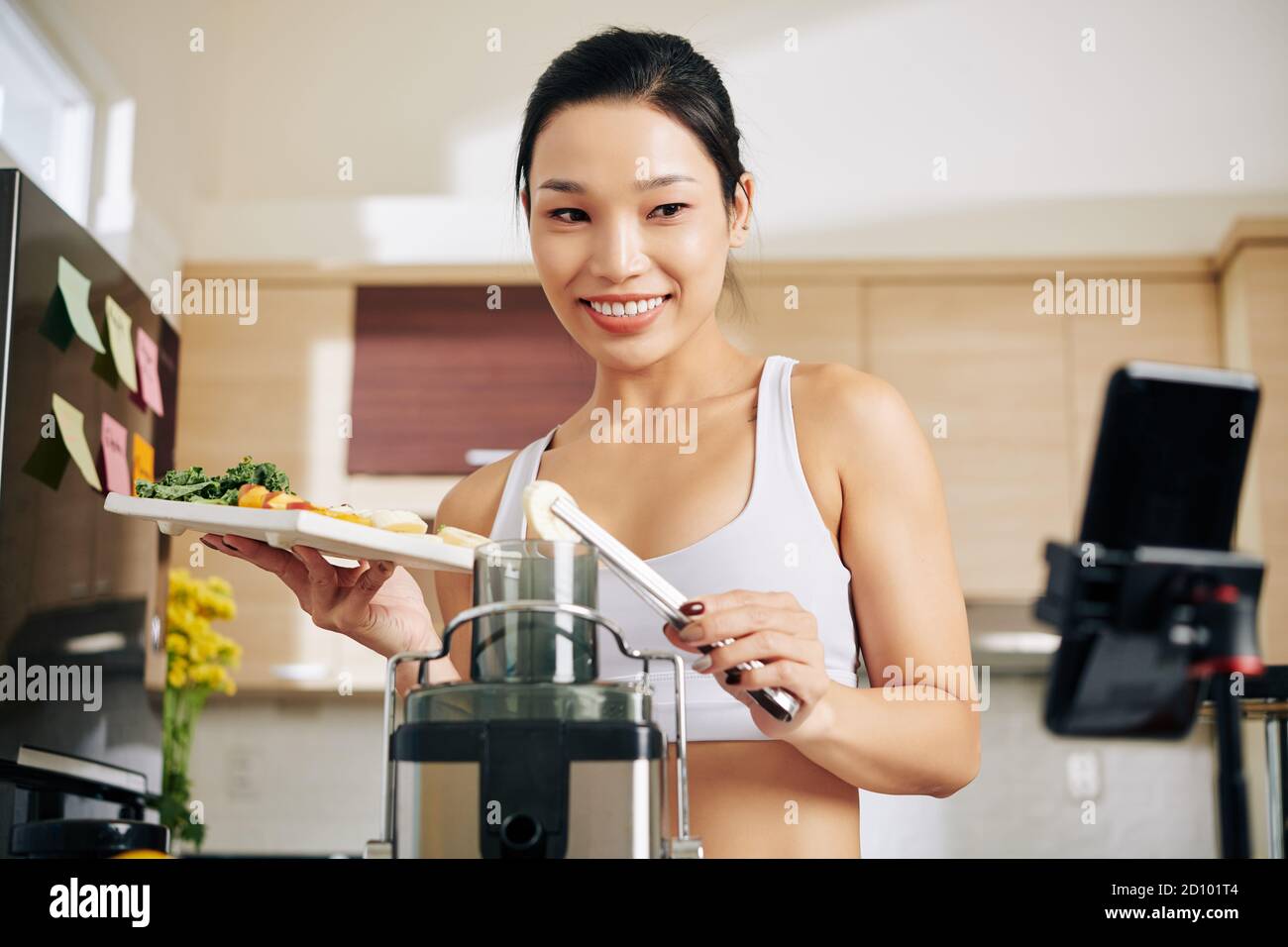 Young athlete eating fruit at sport hi-res stock photography and images ...
