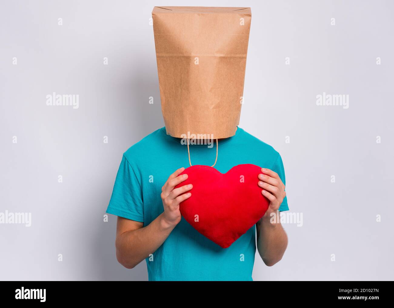 Boy with paper bag over head Stock Photo Alamy