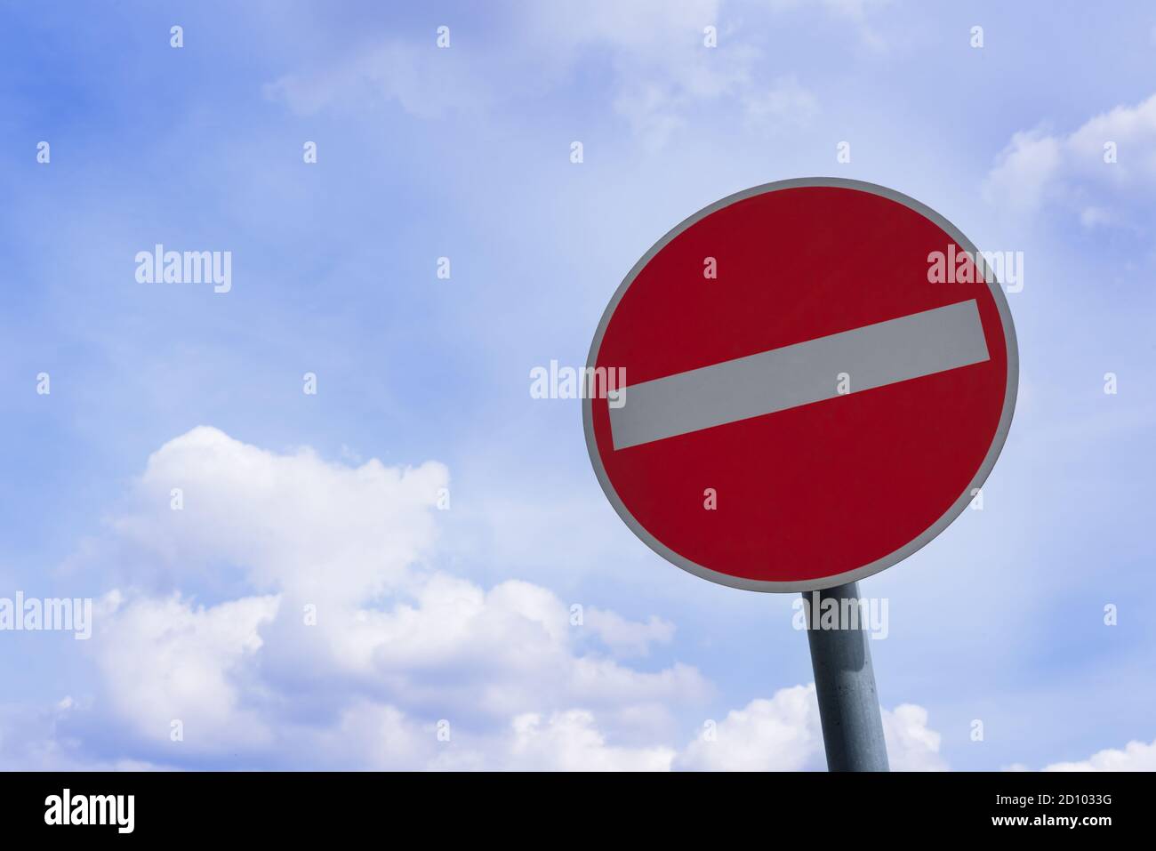 No entry traffic sign isolated against blue sky - forbidden, copy space ...
