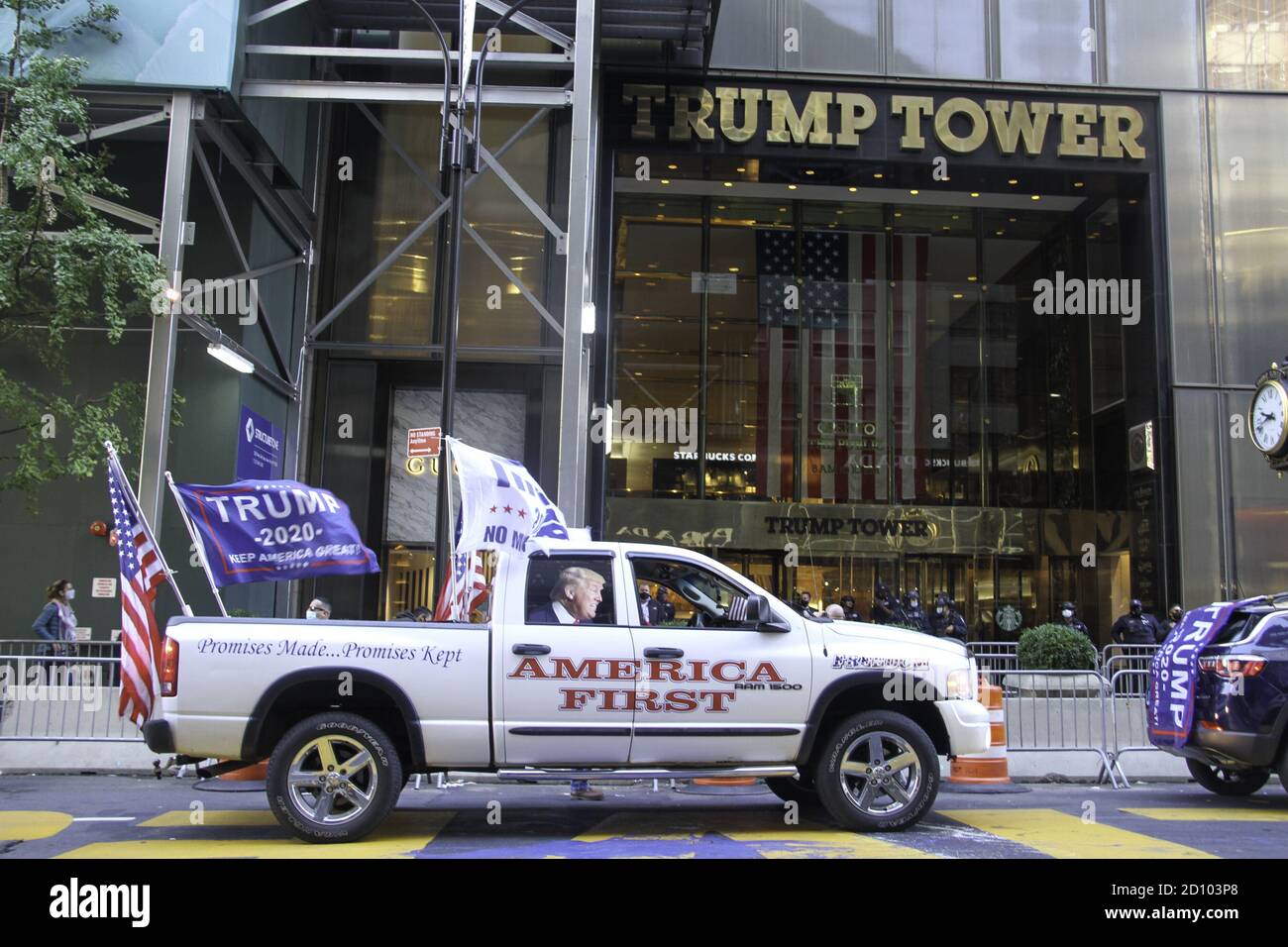 New York, USA. 4th Oct, 2020. (NEW) Trump Supporters rally in front of Trump Tower (NYC) to support the President. October 4, 2020, New York, USA: Trump supporters gather in their cars, in front of Trump Tower on 5th Avenue, Manhattan, New York City to show their support for President Donald J. Trump after he and First Lady, Melania Trump tested positive for Coronavirus early Friday (2) morning and now undergoing medical treatment at Walter Reed Medical Center in Bethesda, Maryland.Credit : Niyi Fote/Thenews2 Credit: Niyi Fote/TheNEWS2/ZUMA Wire/Alamy Live News Stock Photo