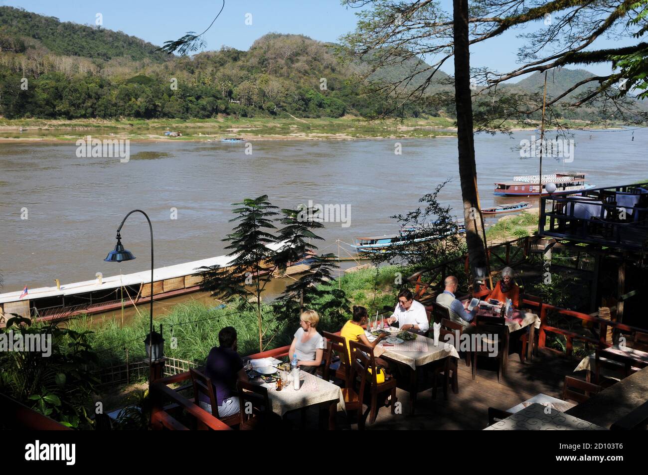 Laos: Nice Restaurant in Luang Prabang city with a wonderfull location at the mekong river. Stock Photo