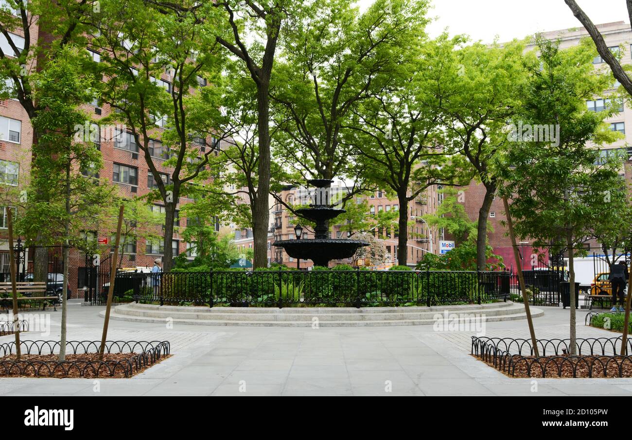 NEW YORK, USA - MAY 10, 2019: Large water fountain in Jackson Square Park at 8th Ave and Greenwich Avenue in New York City on May 10, 2019. The downto Stock Photo