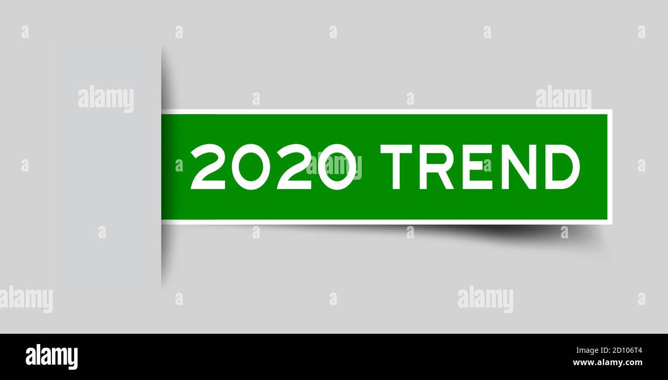 Inserted green color label sticker with word 2020 trend on gray ...