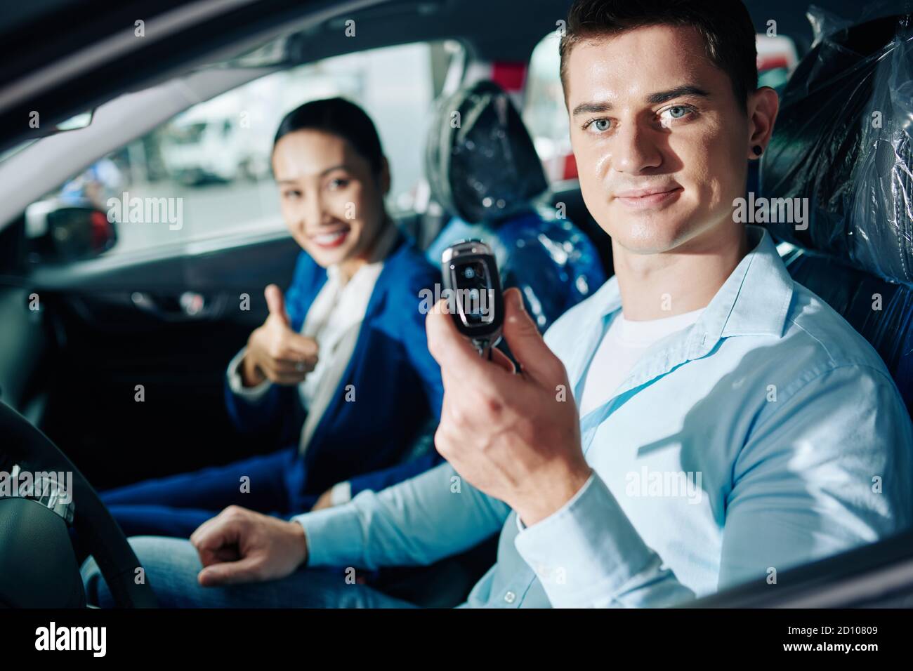 Man showing electronic car keys Stock Photo Alamy