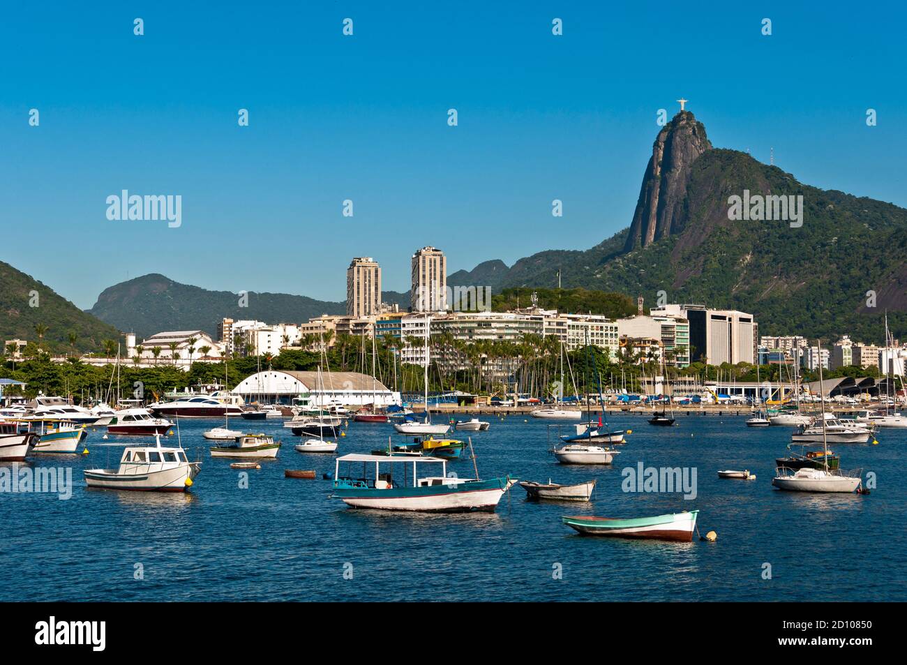 Premium Photo  Yacht club in urca bay of rio de janeiro and christ the  redeemer between the clouds leaning out