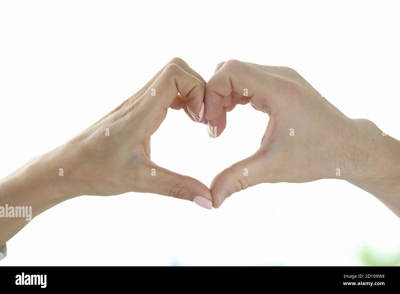 Heart sign made from hands. Stock Photo