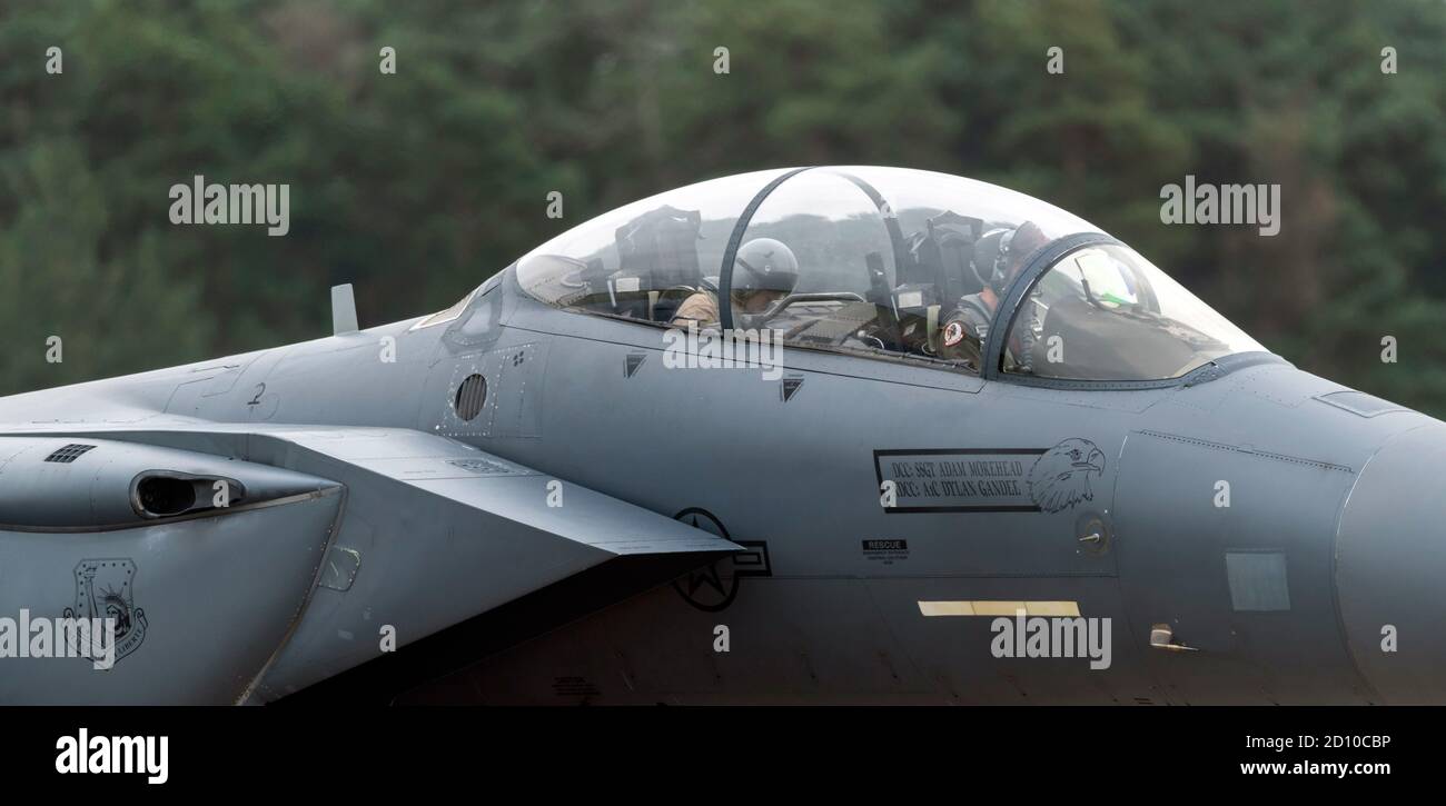 F-15E Strike Eagles of 492nd 'Mad Hatters' squadron at RAF Lakenheath during pre flight checks, Stock Photo