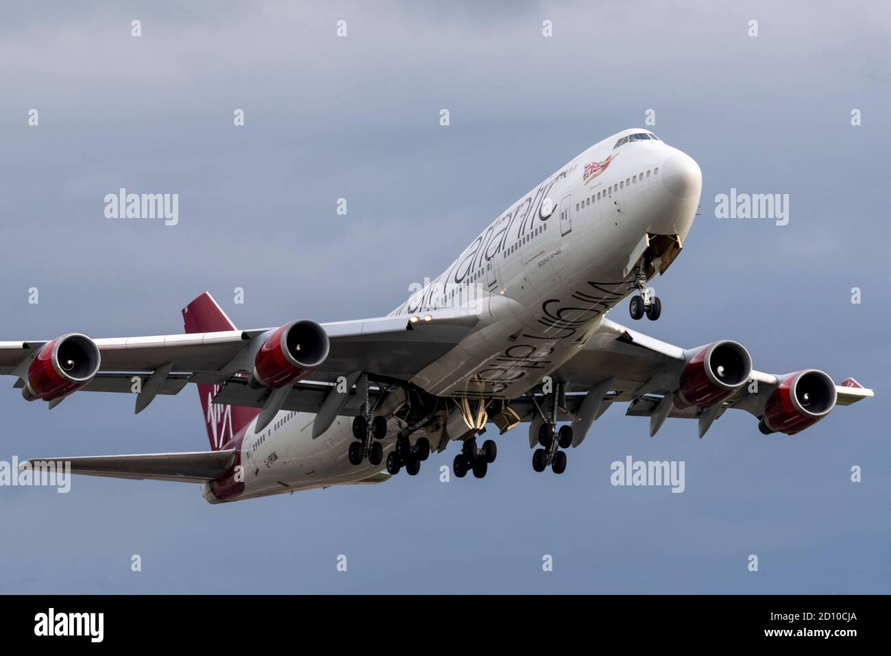 Virgin Atlantic Boeing 747 Jumbo Jet plane taking off from London Heathrow Airport, UK, after being stored. Premature retirement due to COVID19. Sold Stock Photo