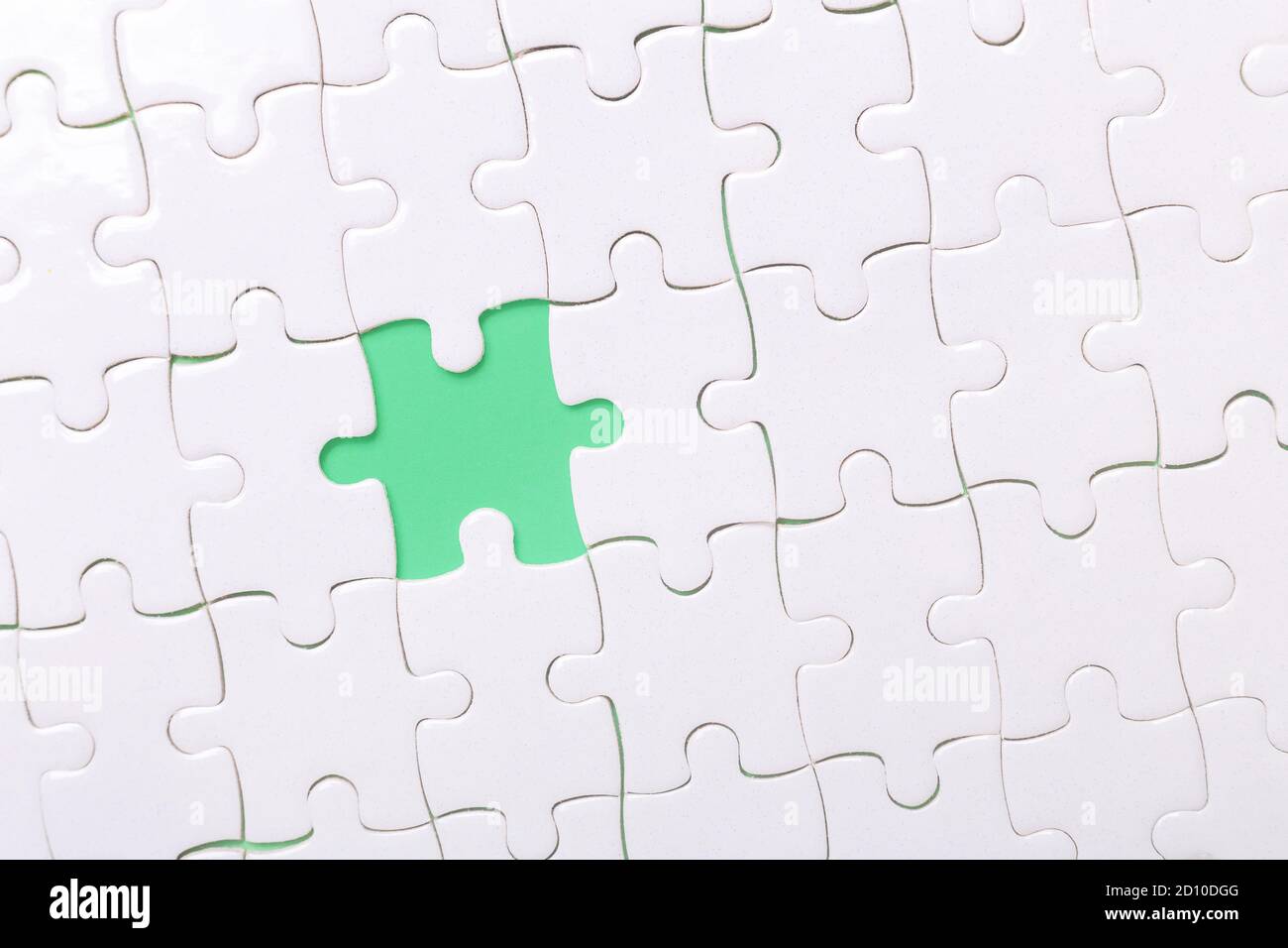 Missing piece of puzzle on white background - Image Stock Photo
