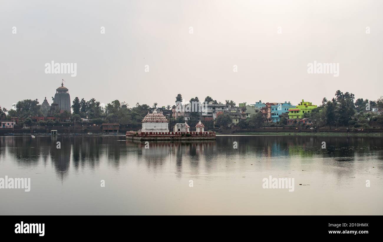 Bhubaneswar, India - February 4, 2020: View over Bindu Sagara lake with reflection of the historic temples on February 4, 2020 in Bhubaneswar, India Stock Photo