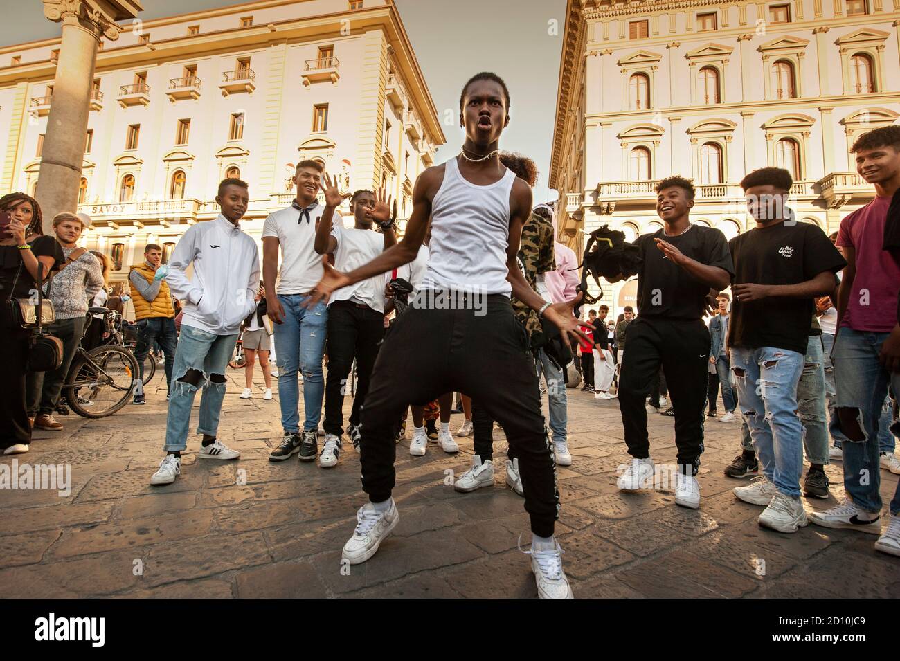 Florence, Italy - 2020, September 26: Unidentified B-boy break dancers perform in the street. Hip Hop battle at a informal street dance meet. Stock Photo