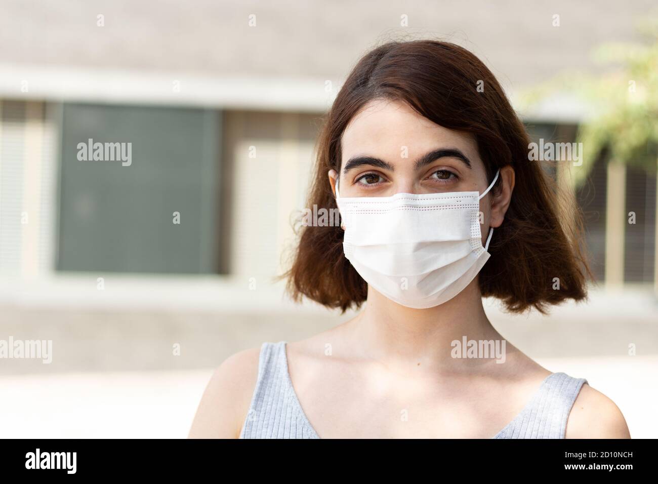 Shallow focus woman facemask hi-res stock photography and images - Alamy