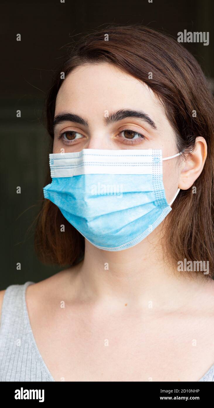 Shallow focus woman facemask hi-res stock photography and images - Alamy