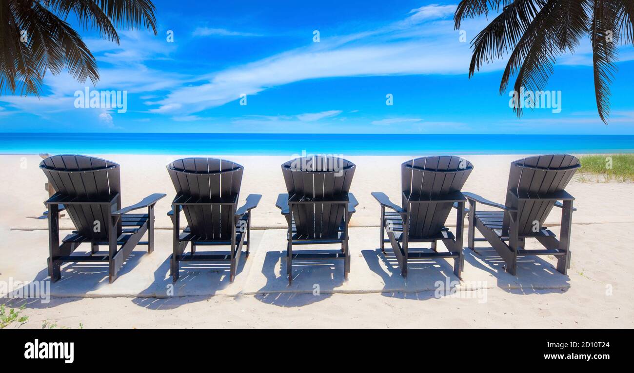 A set of five beach chairs looks very inviting on a summer day