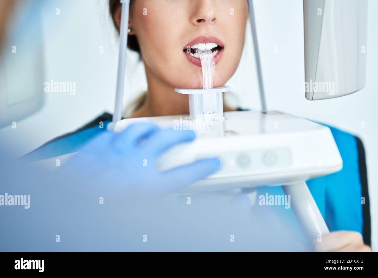 Dentist taking a panoramic digital xray of a patients teeth Stock Photo