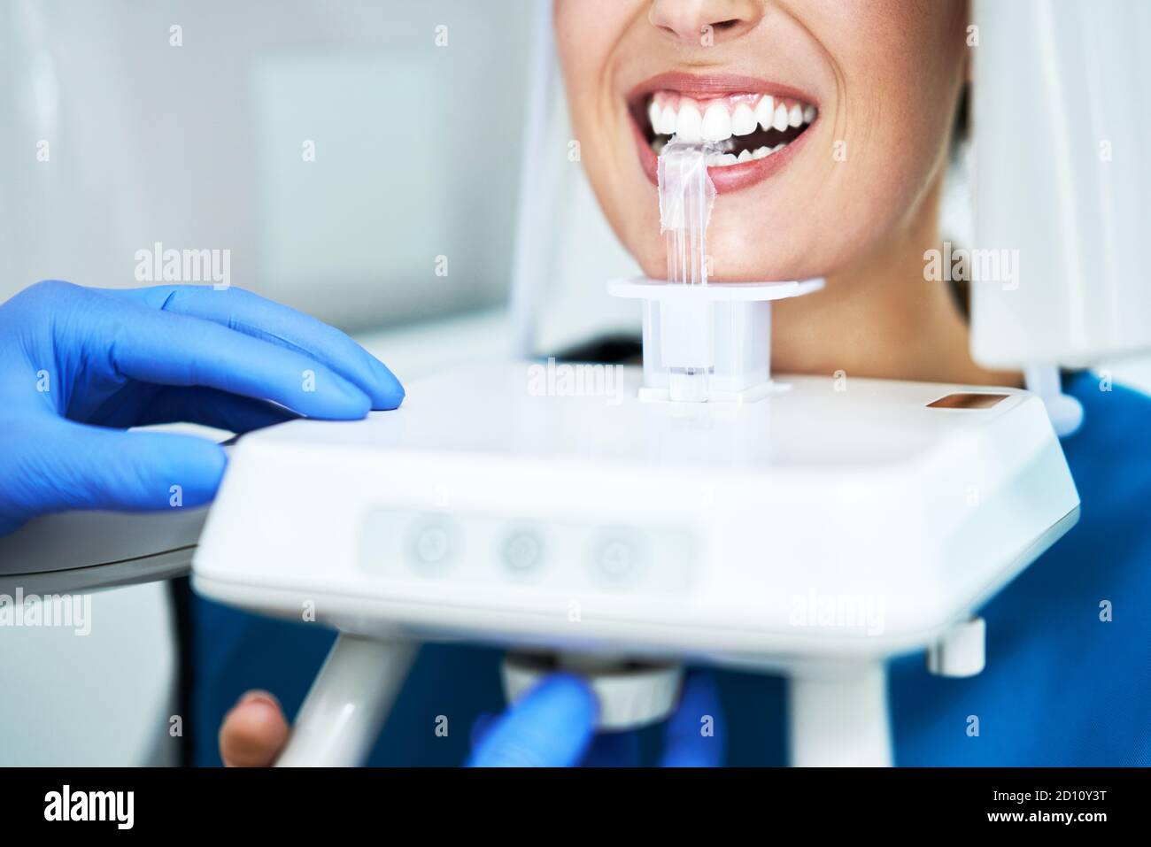 Dentist taking a panoramic digital xray of a patients teeth Stock Photo