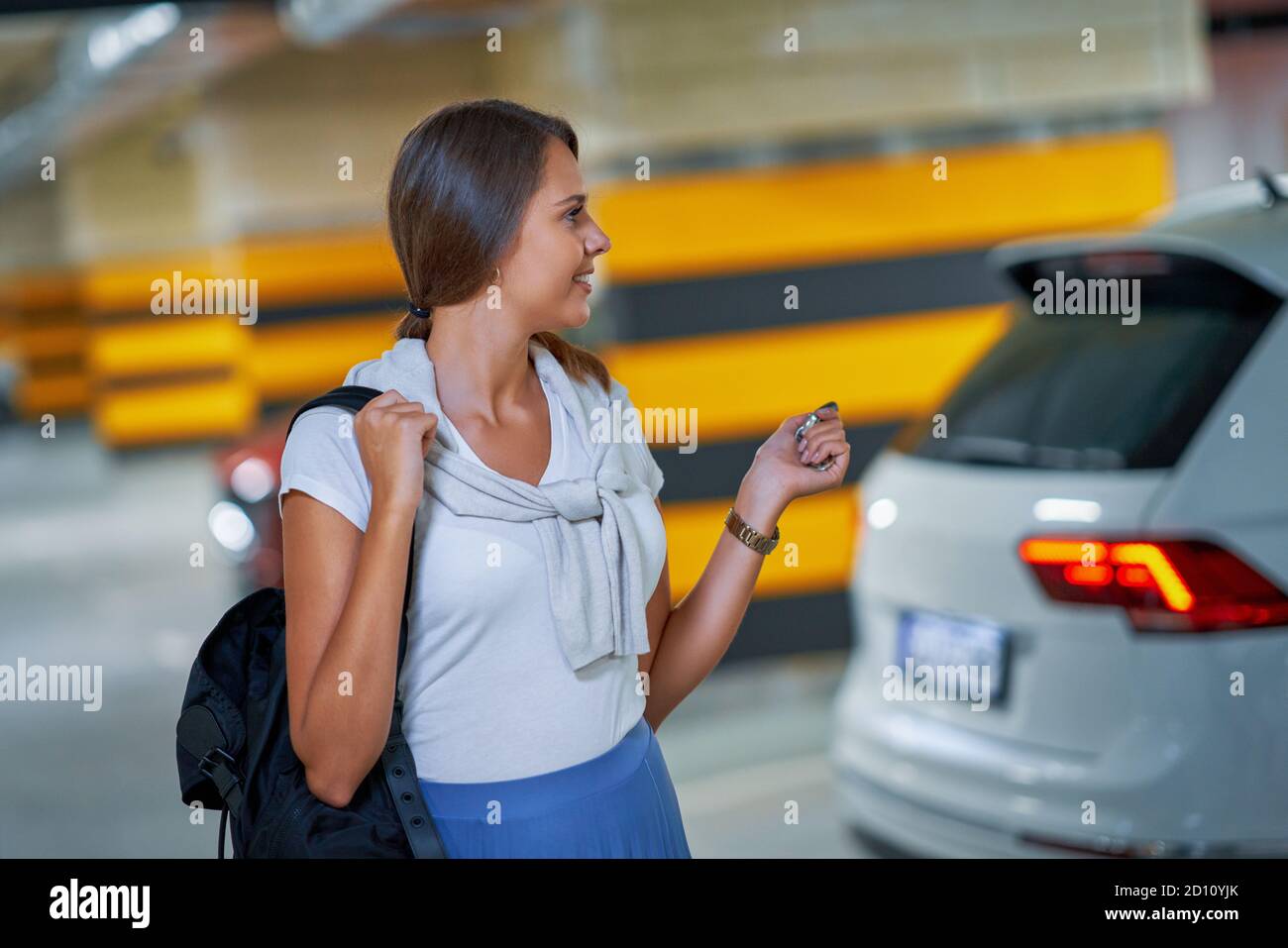 Student leaving car in underground parking lot Stock Photo Alamy