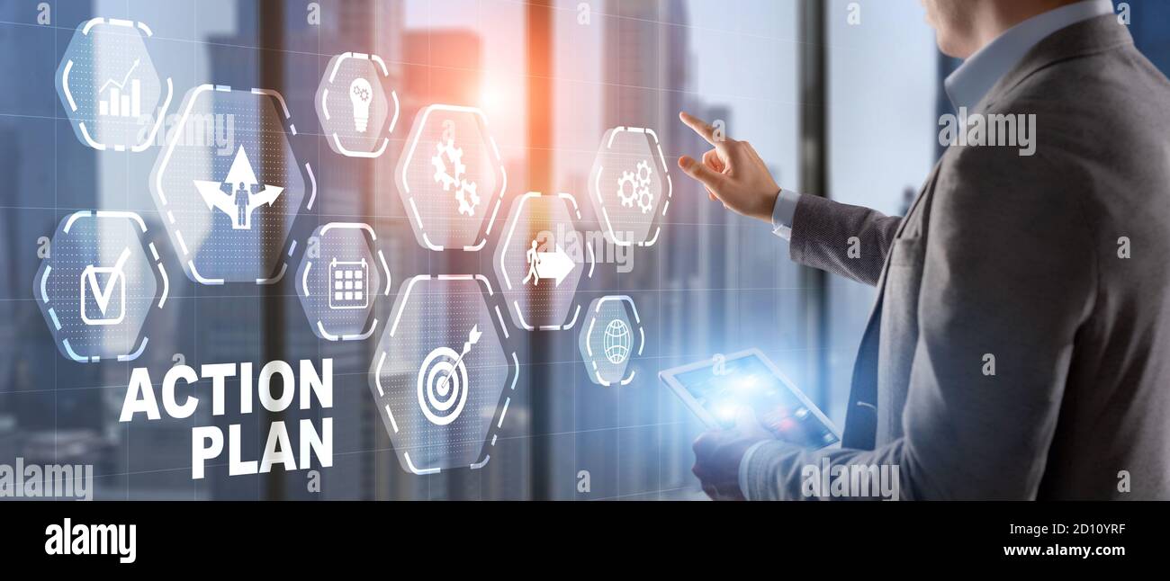 Man is drawing on virtual screen. Action plan concept. Stock Photo