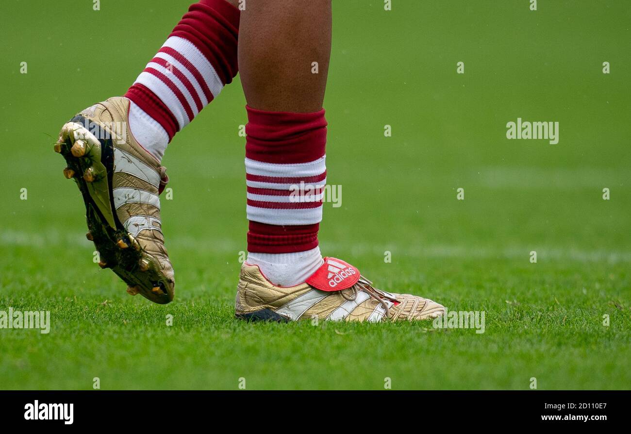 Kingston, UK. 04th Oct, 2020. The Gold Adidas Predator football boots of  Miguel Azeez of Arsenal during the Premier League 2 match played behind  closed doors between Chelsea U23 and Arsenal U23