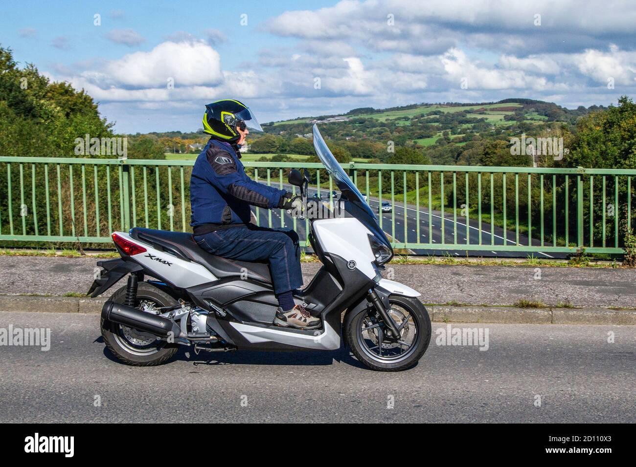 2015 Yamaha white YP 250 RA X-Max ABS PK15VTV; Motorbike rider; two-wheeled transport, motorcycles, vehicle, roads, motorbikes, bike riders motoring in Chorley, UK Stock Photo