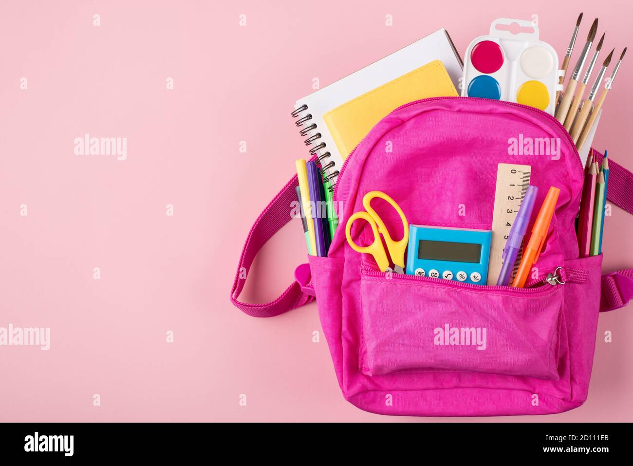 Top above overhead view photo of pink backpack and colorful stationery ...