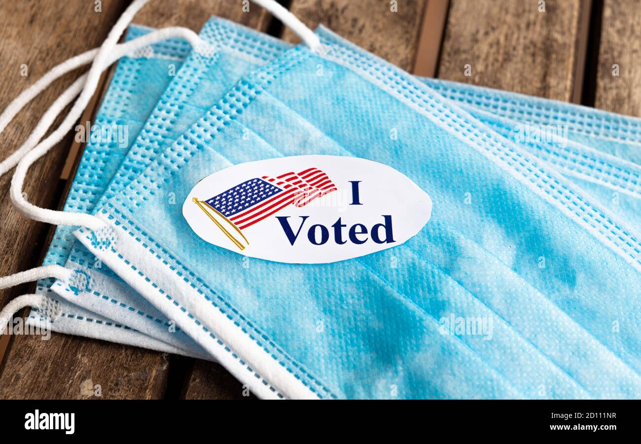I voted sticker for presidential election in United States, politics sign on face mask Stock Photo