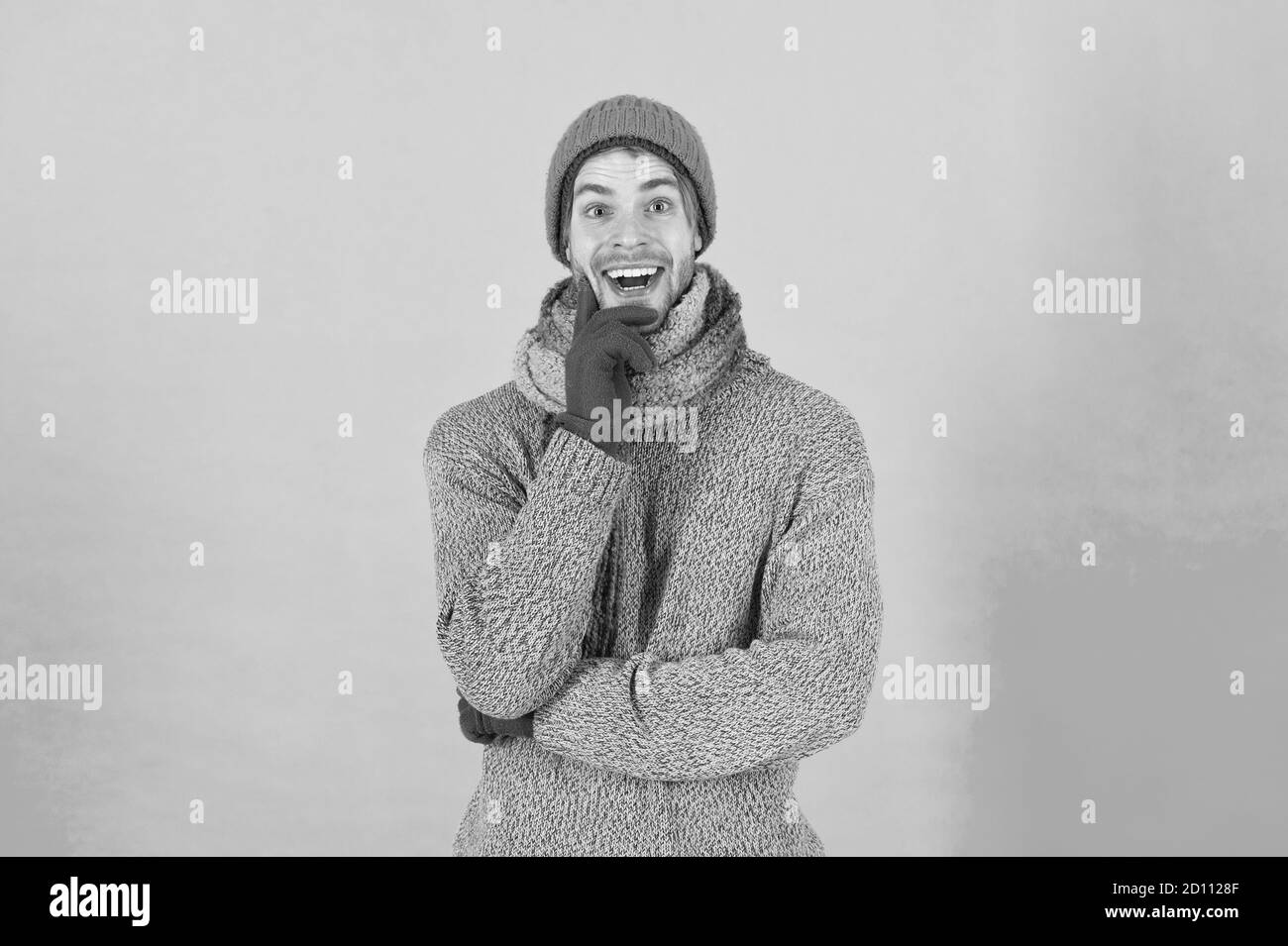 When weather turns chilly. Happy man in winter style blue background. Handsome guy in casual comfy style. Winter fashion and accessories. Keep warm in style. Maintaining your style is easy. Stock Photo