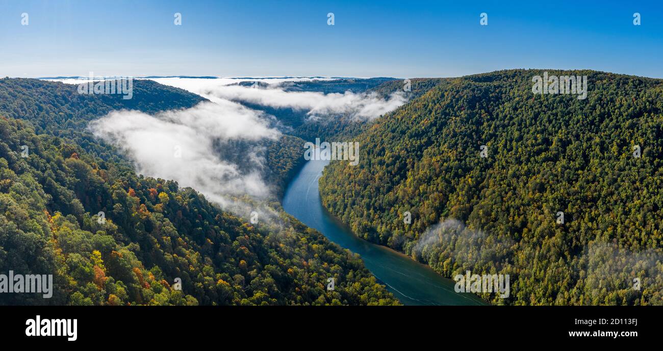 Aerial drone image of the Cheat River flowing through narrow wooded gorge in the autumn towards Cheat Lake near Morgantown, WV Stock Photo