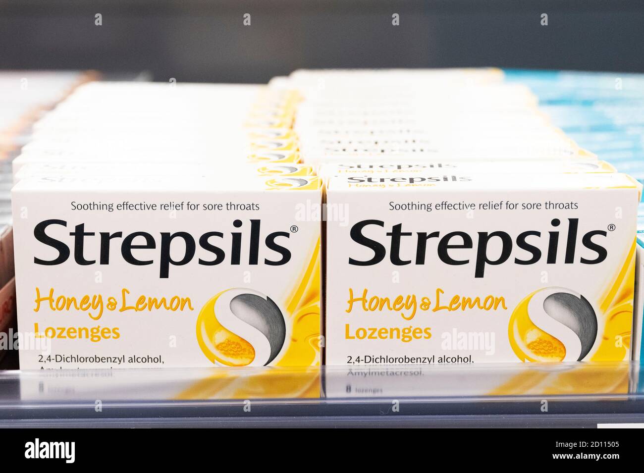 Packets of Strepsils on sale on a shelf in a supermarket in Cardiff, Wales, United Kingdom. Stock Photo