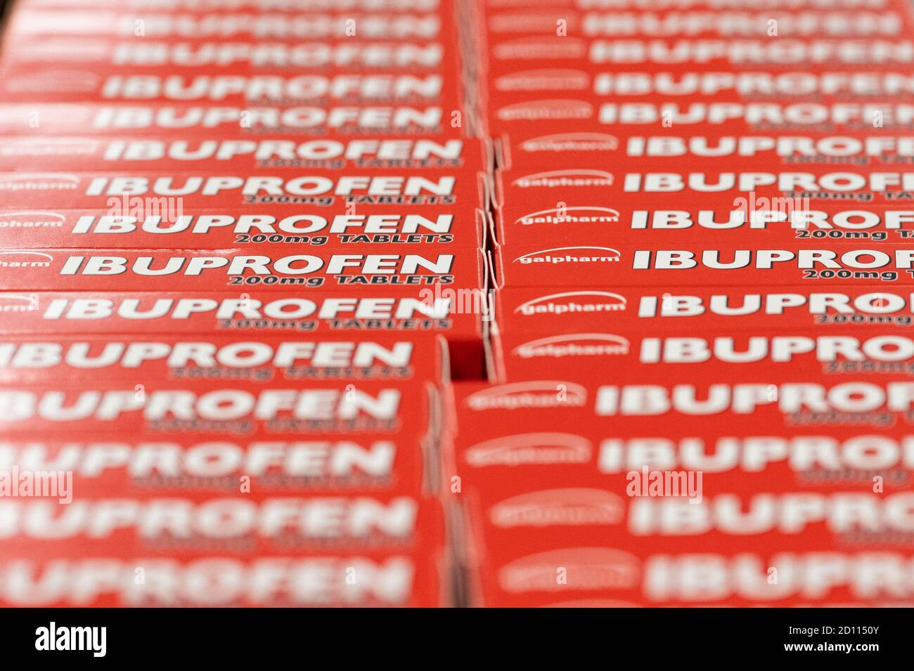 Packets of Ibuprofen on sale on a shelf in a supermarket in Cardiff, Wales, United Kingdom. Stock Photo