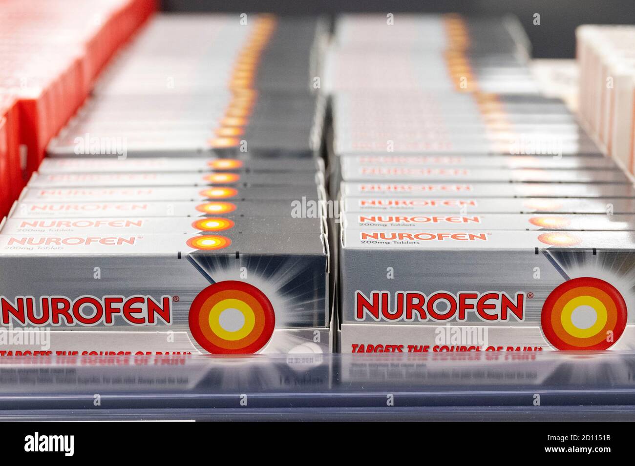 Packets of Nurofen on sale on a shelf in a supermarket in Cardiff, Wales, United Kingdom. Stock Photo