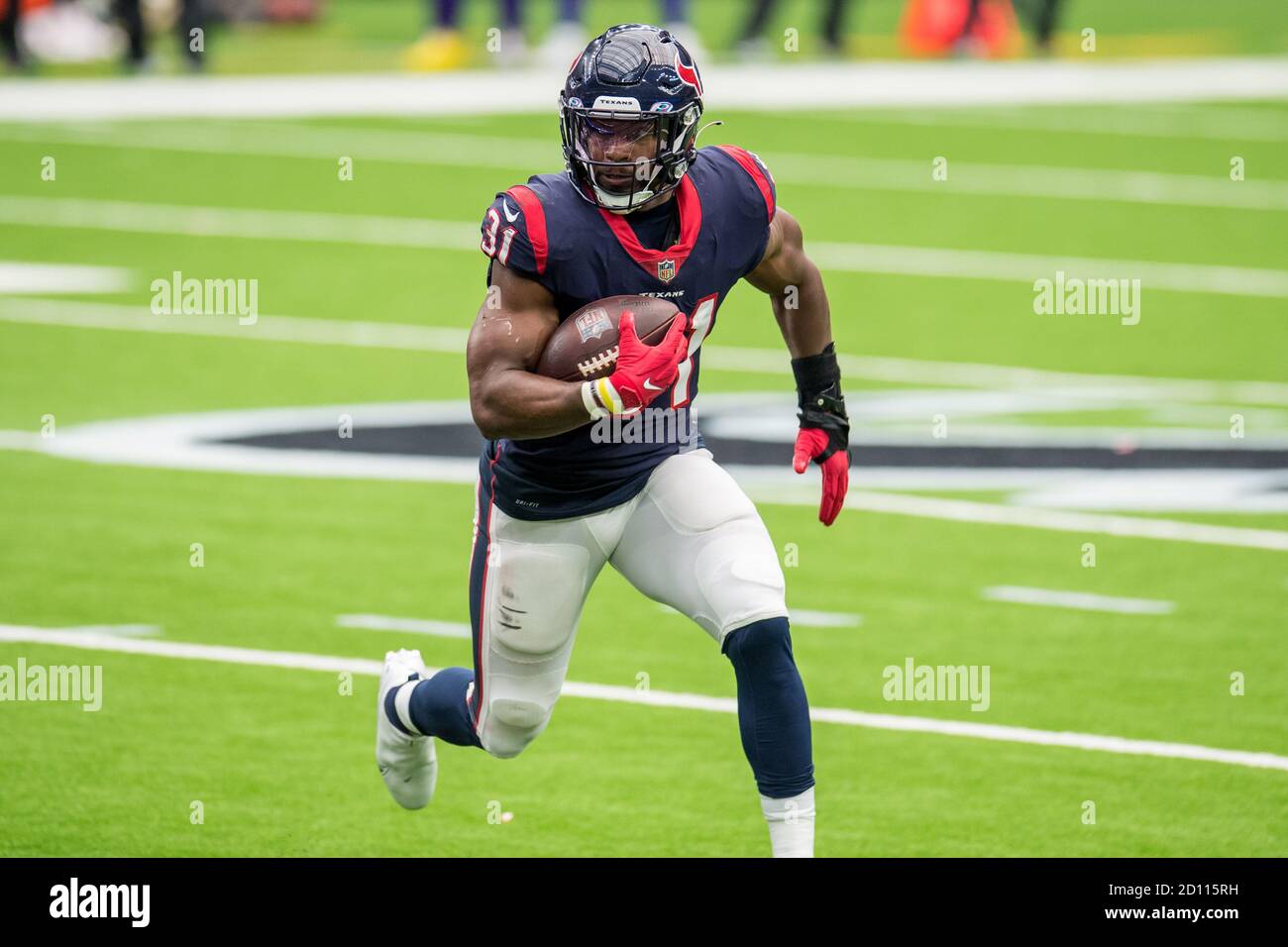 Houston, TX, USA. 4th Oct, 2020. Houston Texans running back David Johnson  (31) carries the ball during the 4th quarter of an NFL football game  between the Minnesota Vikings and the Houston, image size:1300x956