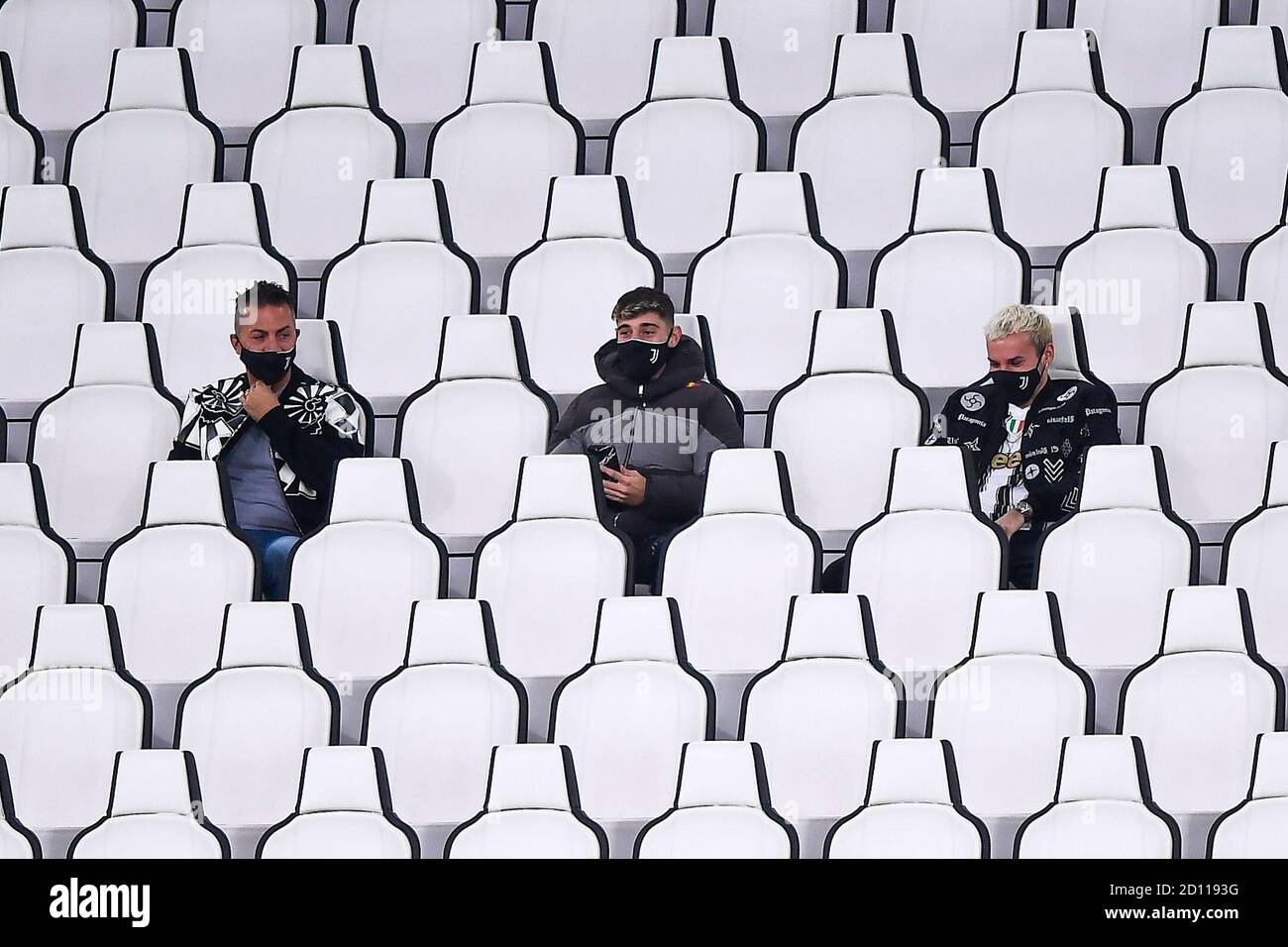 TURIN, ITALY - October 04, 2020: Fans of Juventus FC attend the scheduled  Serie A football match between Juventus FC and SSC Napoli. In all  likelihood Juventus FC will be awarded a