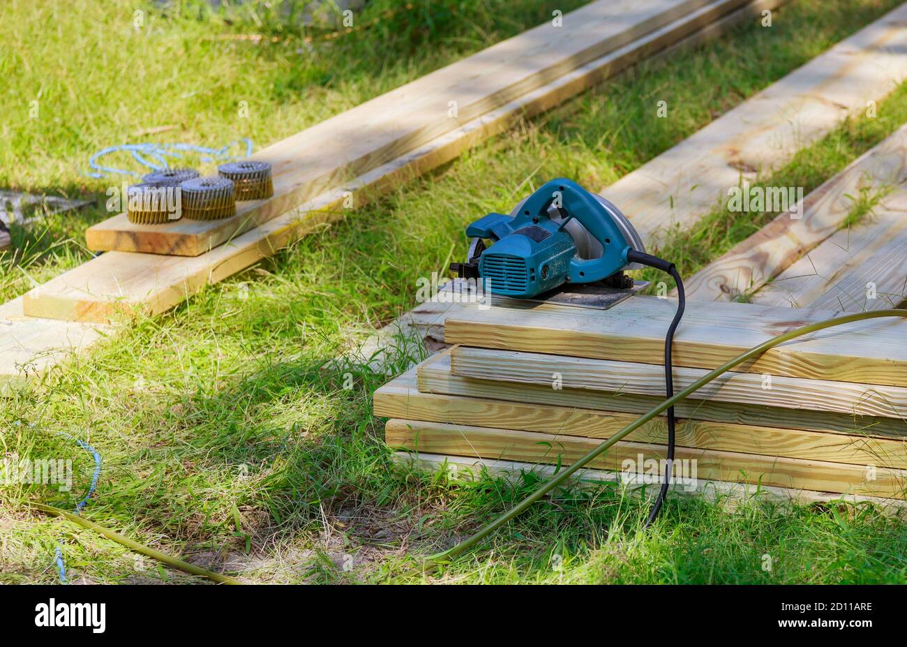 Circular saw for wood beam a new home constructiion project Stock Photo
