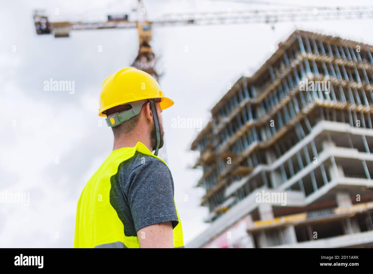 Engineer architecture employee worker on construction site looking on ...