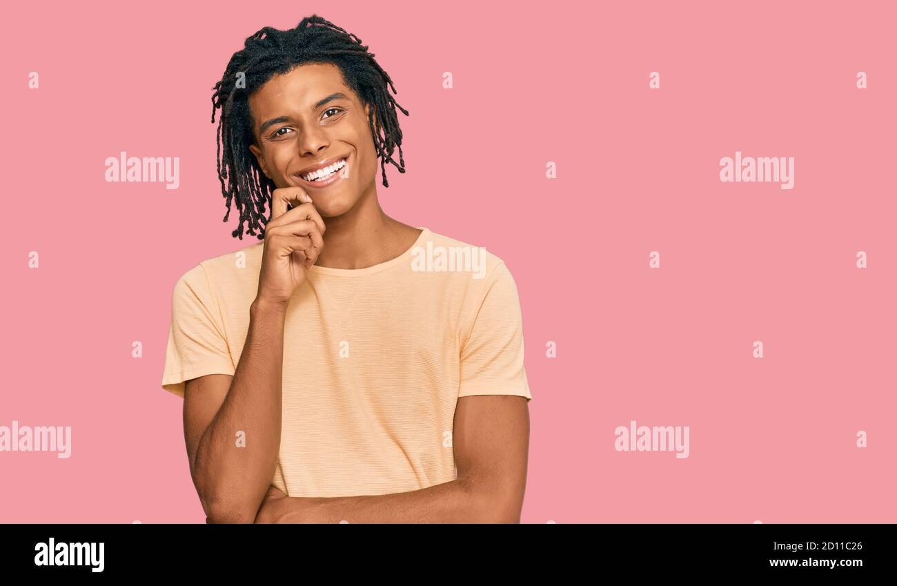 Young african american man wearing casual clothes looking confident at ...