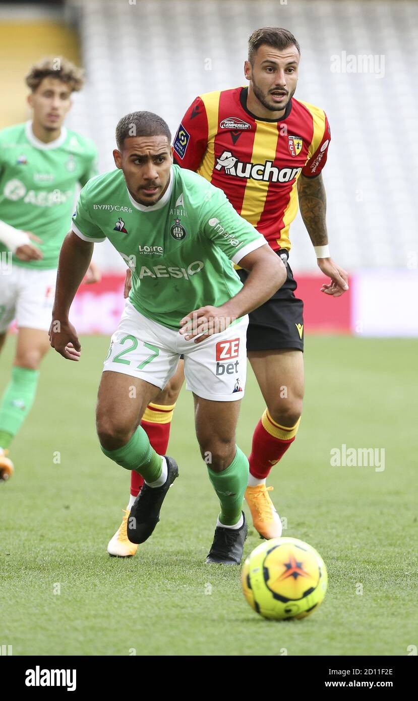 Ivann Macon of Saint-Etienne, Jonathan Clauss of Lens during the French championship Ligue 1 football match between RC Lens and AS Saint Etienne (ASSE Stock Photo