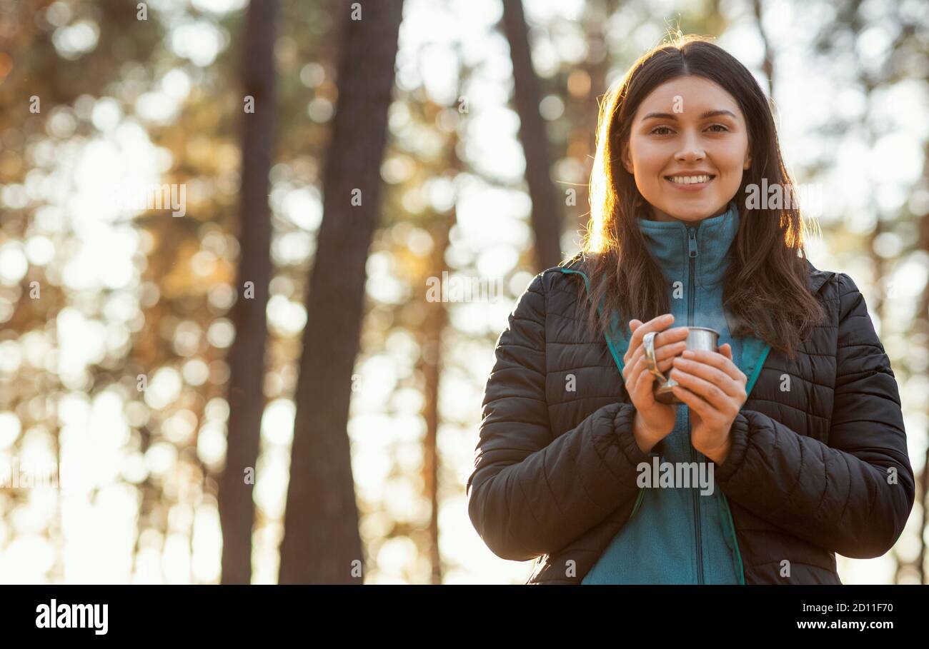 Pretty Smiling Girl Backpacker Enjoying Her Hot Tea Stock Photo Alamy pretty-smiling-girl-backpacker-enjoying-her-hot-tea-stock-photo-alamy
