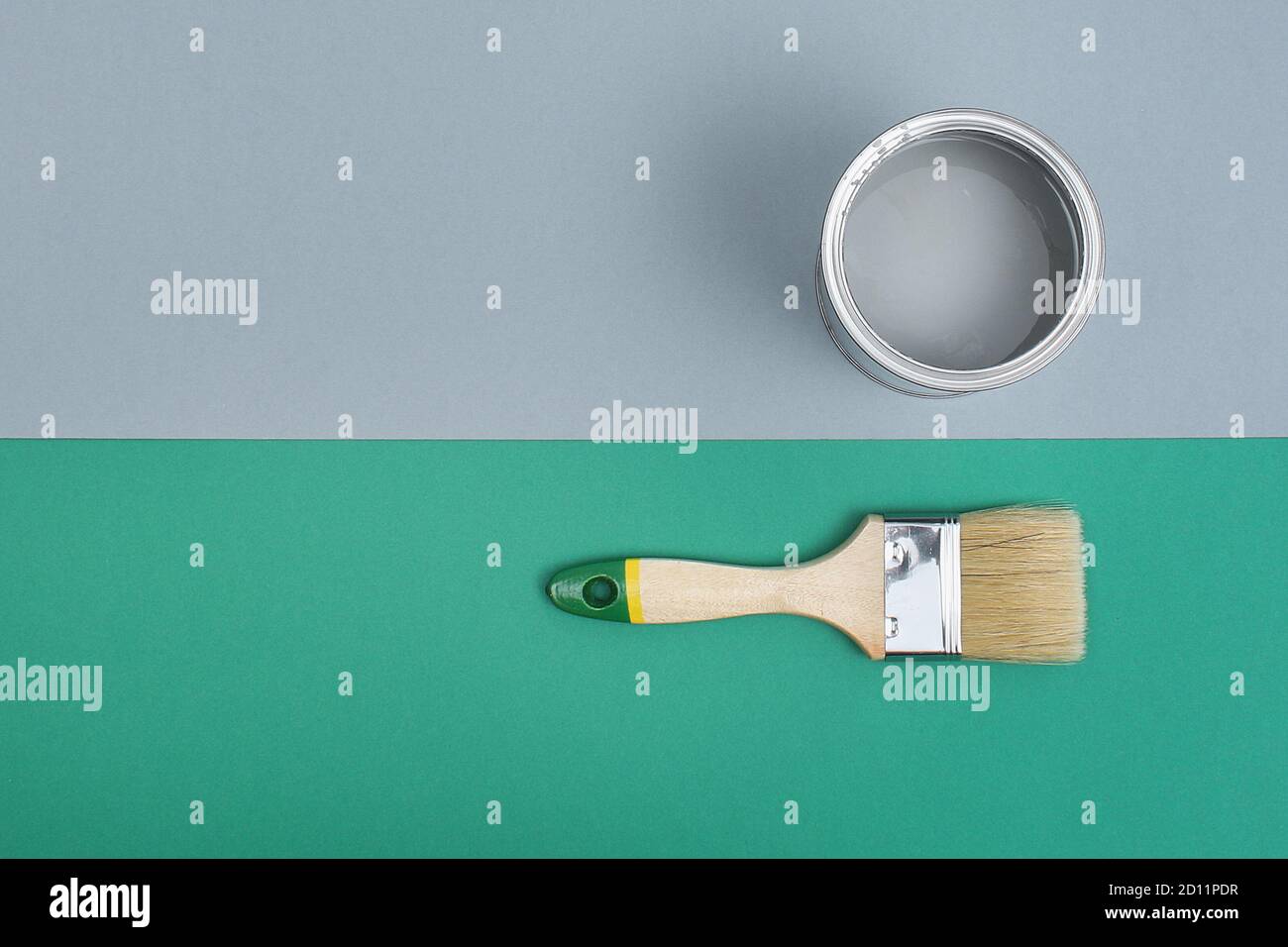 Open paint enamel cans on gray green palette samples. The concept of repair, construction Stock ...