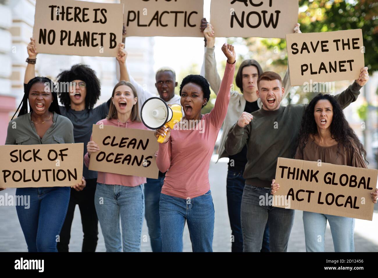 International group of demonstrators fighting for healthy environment Stock Photo