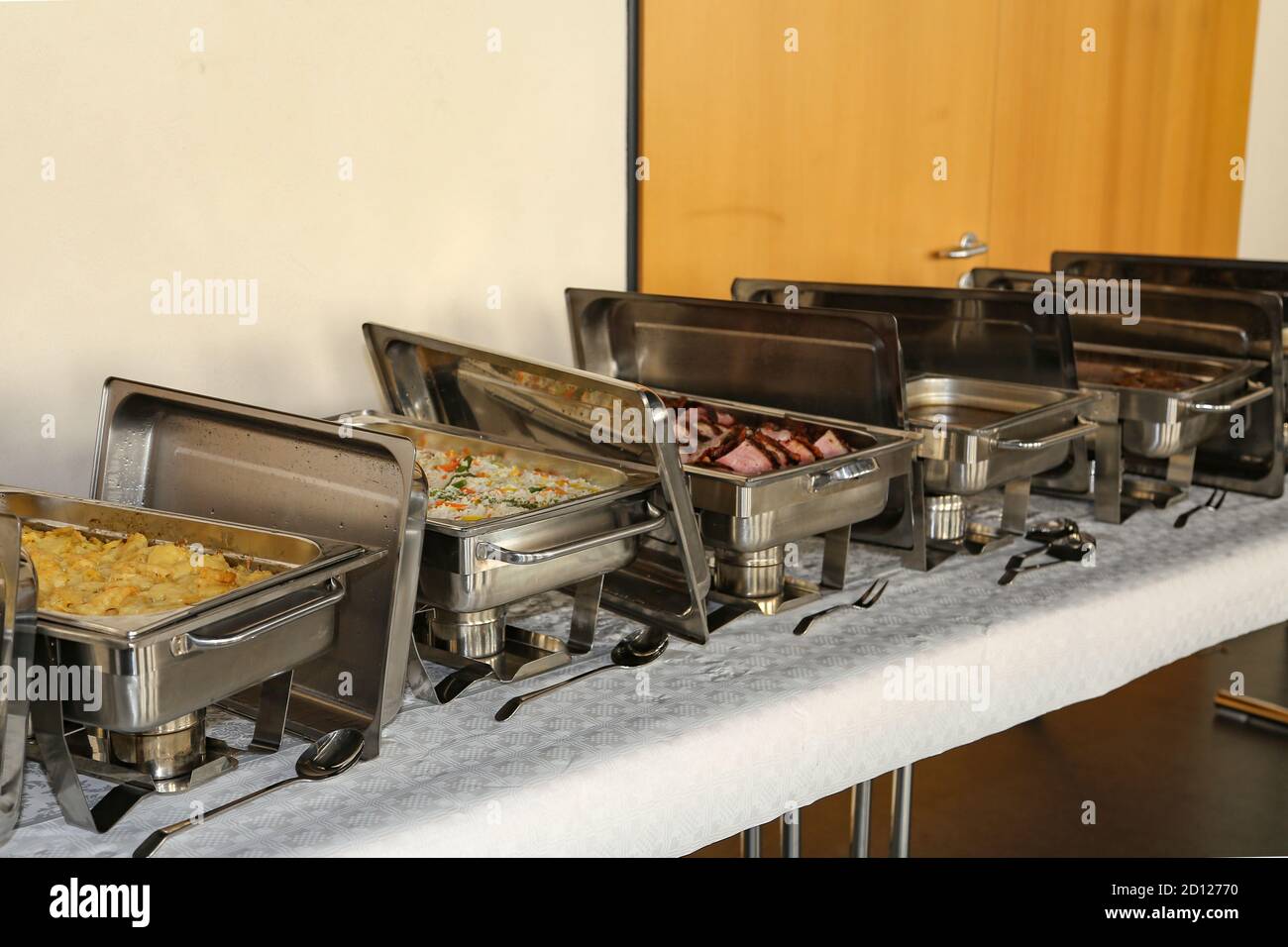 Row of food buffet for catering Stock Photo - Alamy